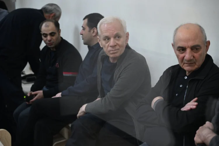 "Başıma yumruqla, avtomatın qundağı ilə vururdu"